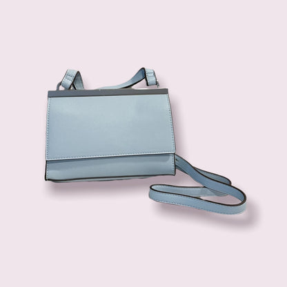 NUEVO - Cartera celeste International Concepts INC - SOLO QUEDA 1 UNIDAD